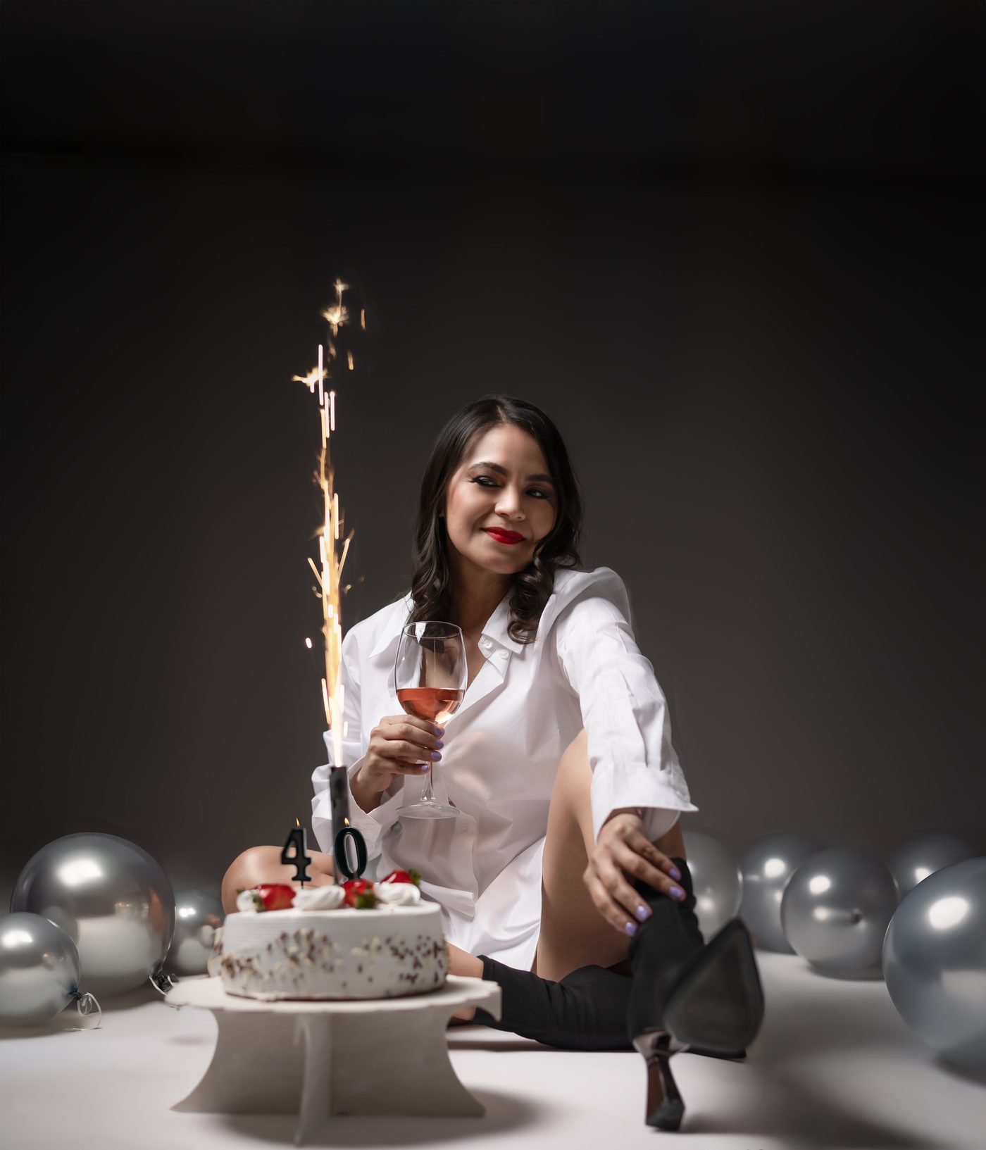 Sesión de cumpleaños con vino y velas